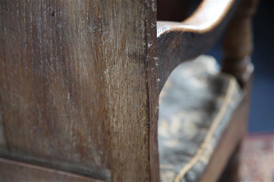 A 17th century oak Wainscot chair, W.2ft 2in. H.3ft 8in. incorporating later timbers